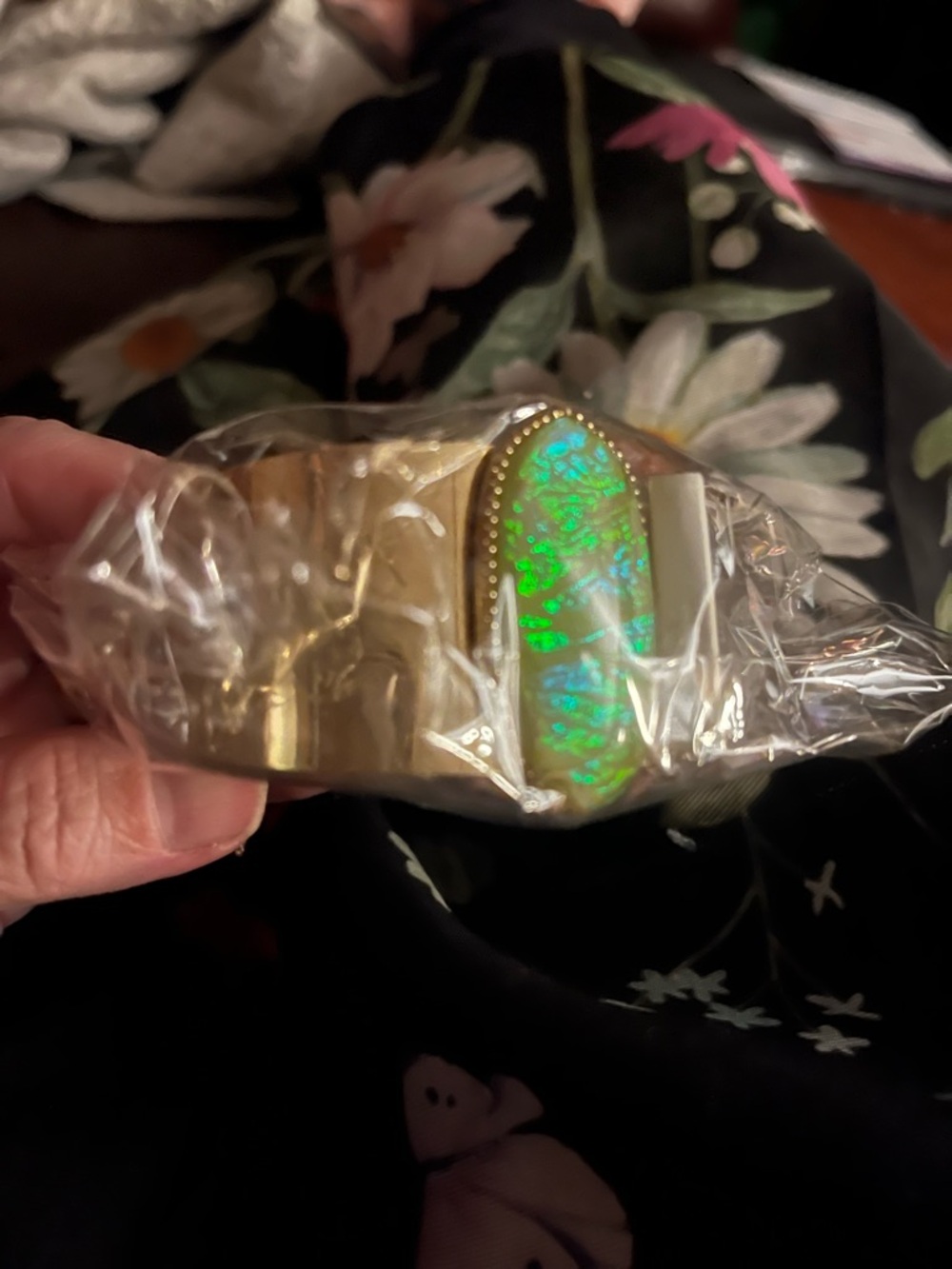 Gold Tone Cuff Bracelet with Green Opalescent Center Stone
